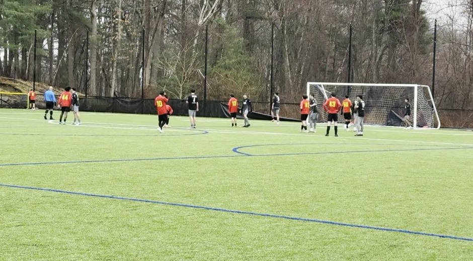 Unedited game video frame of a soccer match
